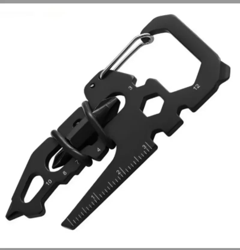Black stainless steel credit card-sized multi-tool with keychain carabiner, ruler, and hex wrenches.