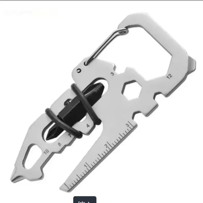 Silver stainless steel multi-functional card tool with keychain clip, ruler, and screwdriver bit.