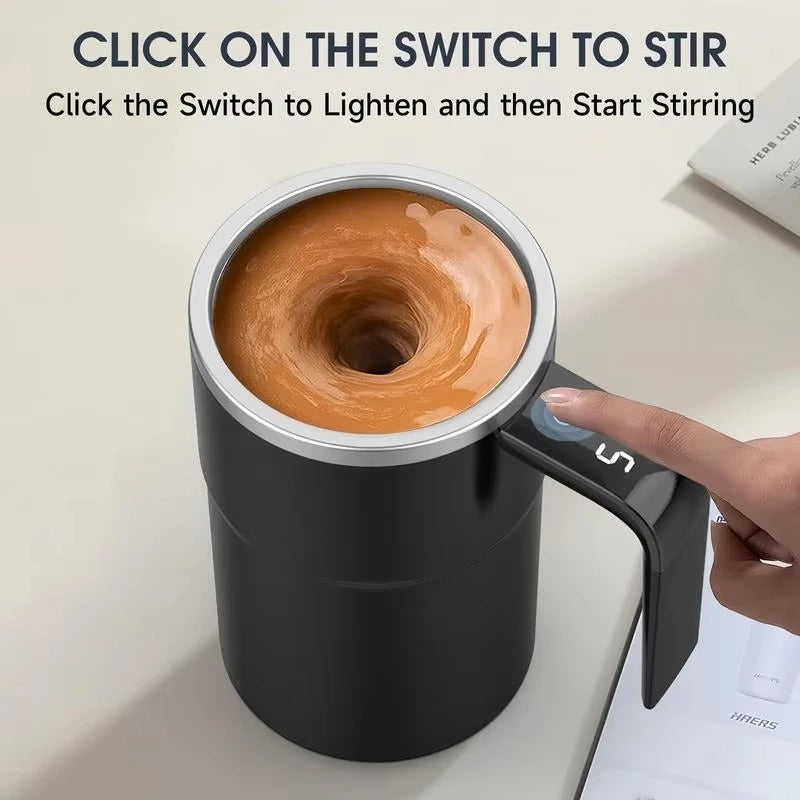 Close-up of self-stirring coffee mug with a one-touch button and digital display.