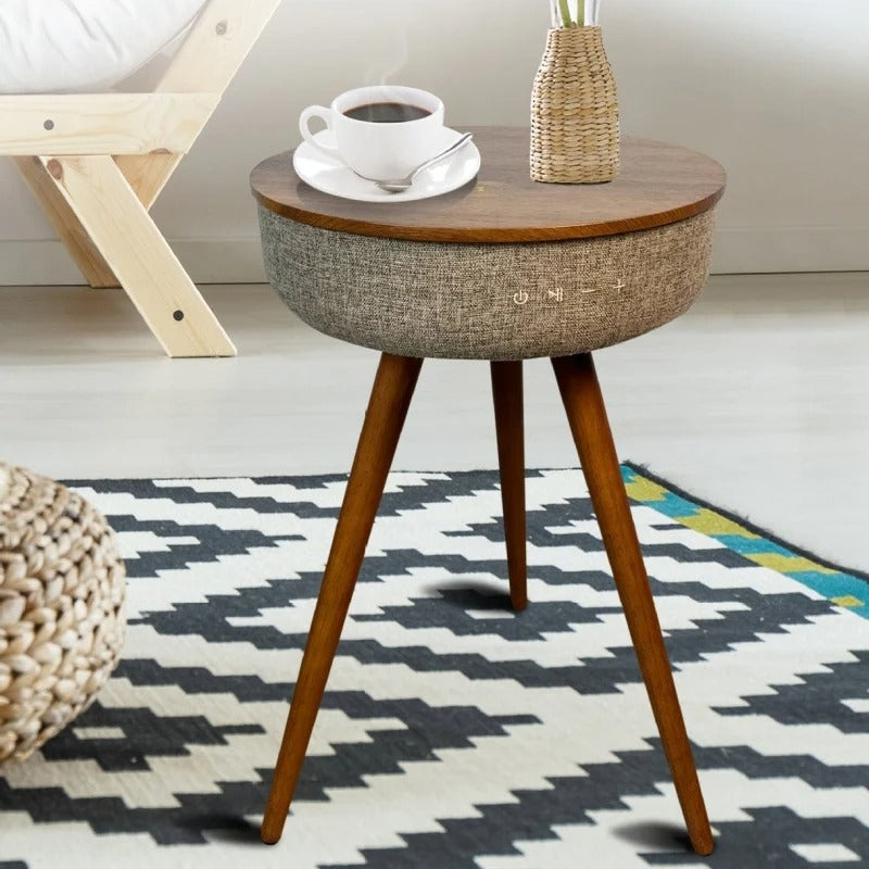 Stylish smart coffee table in a cozy living room setting with coffee cup