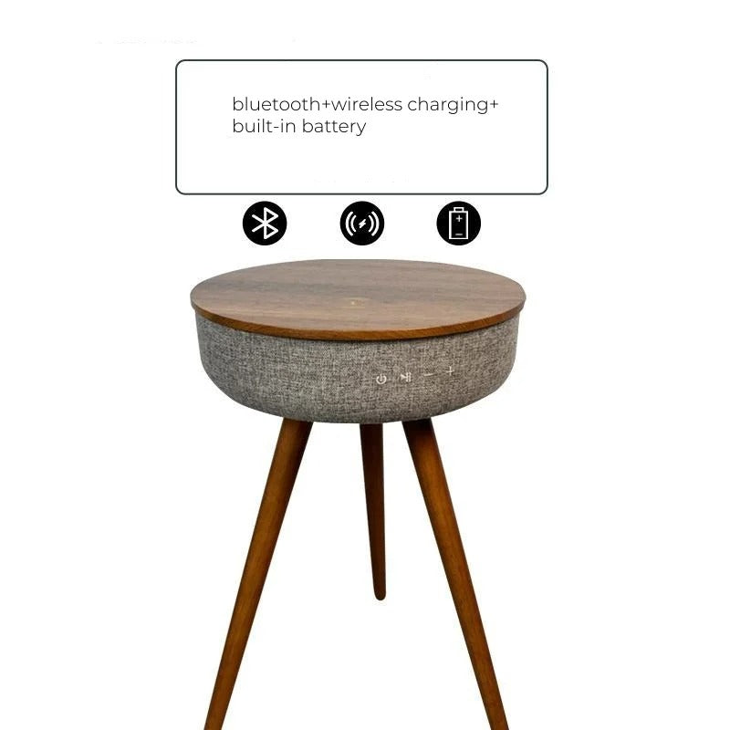 Walnut-finish smart coffee table with Bluetooth speakers, wireless charging, and a built-in battery