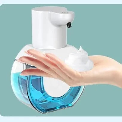 Foam version of touchless soap dispenser releasing thick foam onto hand