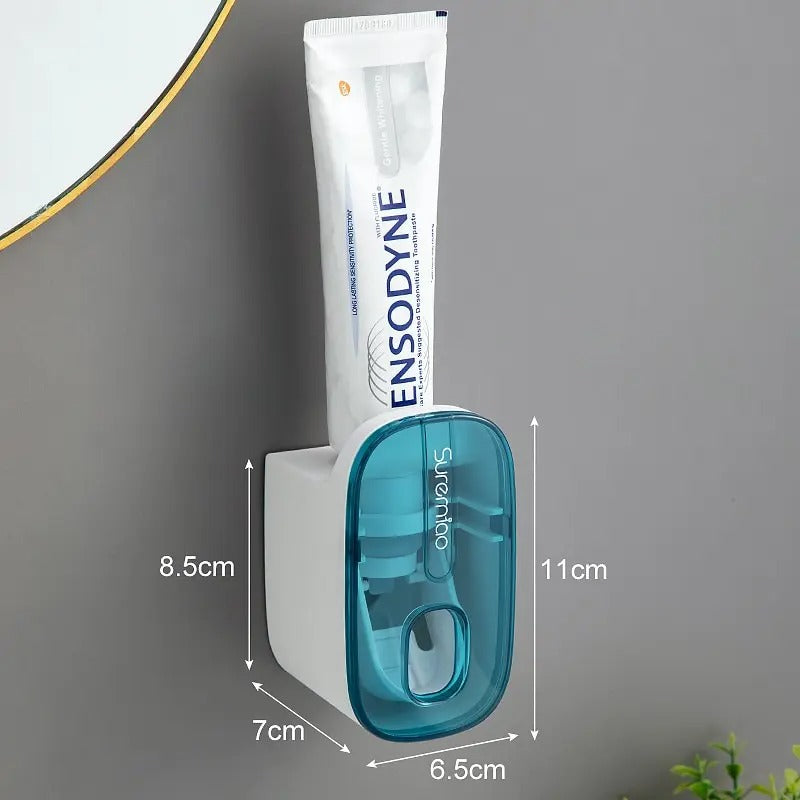 Blue wall-mounted automatic toothpaste dispenser with size measurements labeled in centimeters