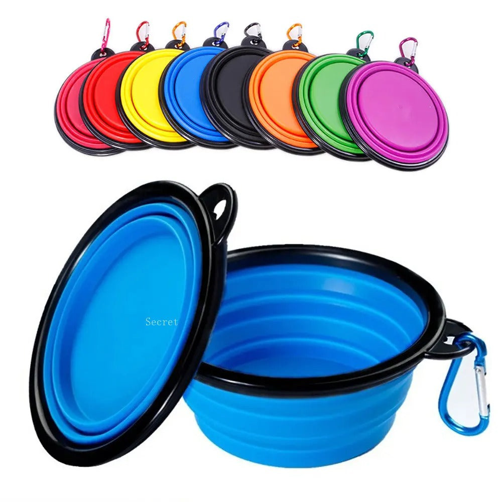 Blue collapsible pet food bowl with carabiner clip, displayed alongside a vibrant multi-color set of foldable travel bowls. Perfect for on-the-go feeding and hydration.