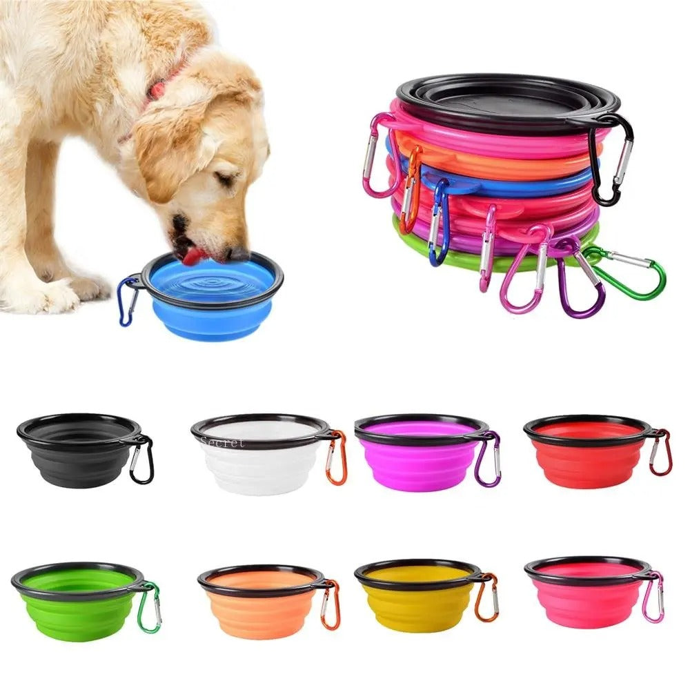 Collapsible pet food bowls in multiple vibrant colors, stackable with carabiner clips. Includes a golden retriever drinking from a blue portable bowl. Ideal for travel and outdoor use.