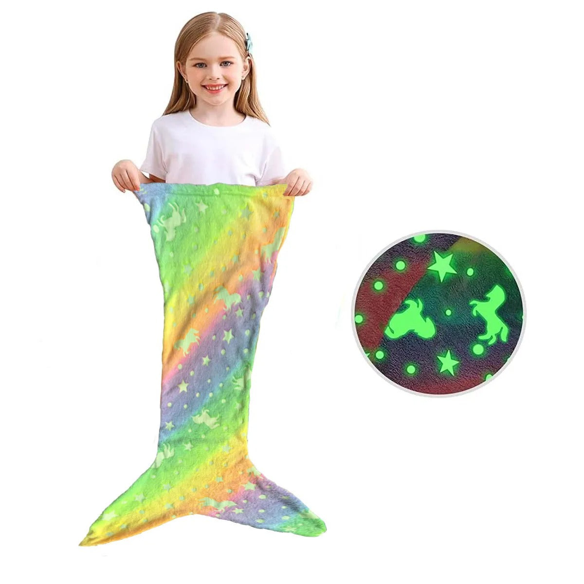 Girl holding rainbow Mermaid Galaxy Glow Blanket with glowing unicorn and star design