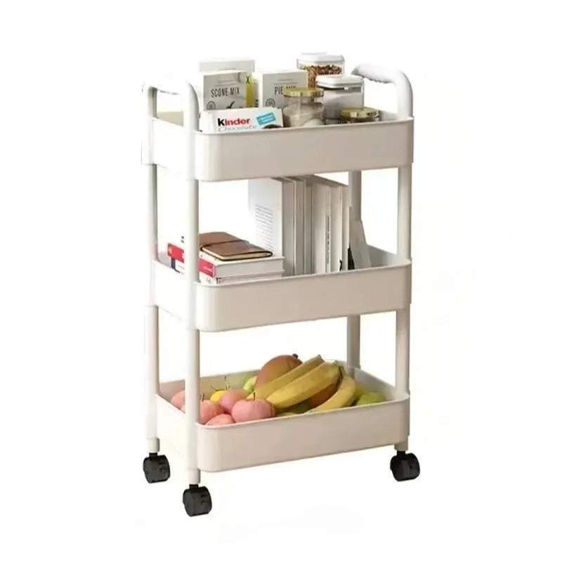 Three-tier rolling kitchen storage cart used for organizing food, books, and household items.